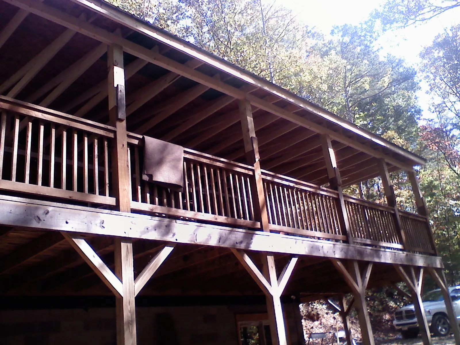 Timber framing under a new elevated porch and deck — Roof Leak Repair in Safety Harbor by Roofing Brothers